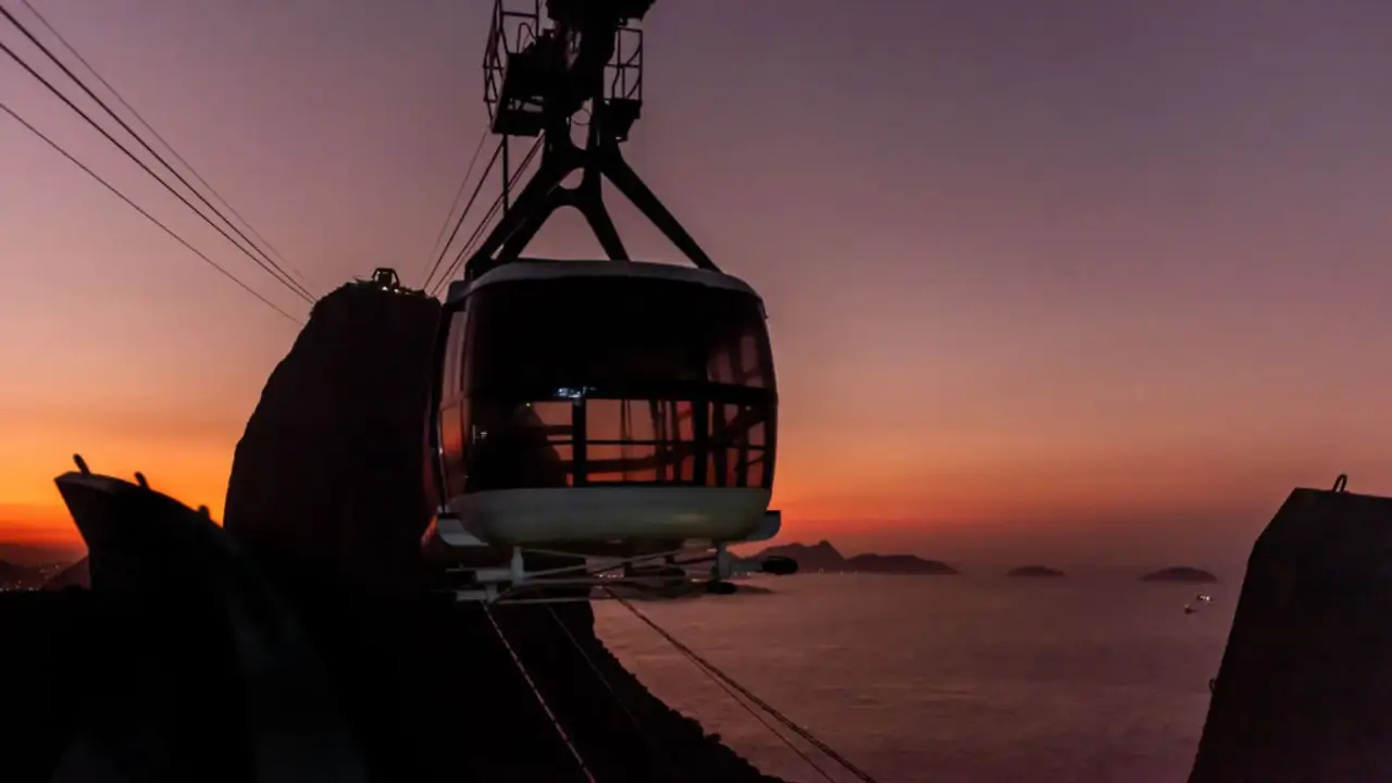 Sunrise at Sugarloaf Mountain and Christ the Redeemer in Rio de Janeiro