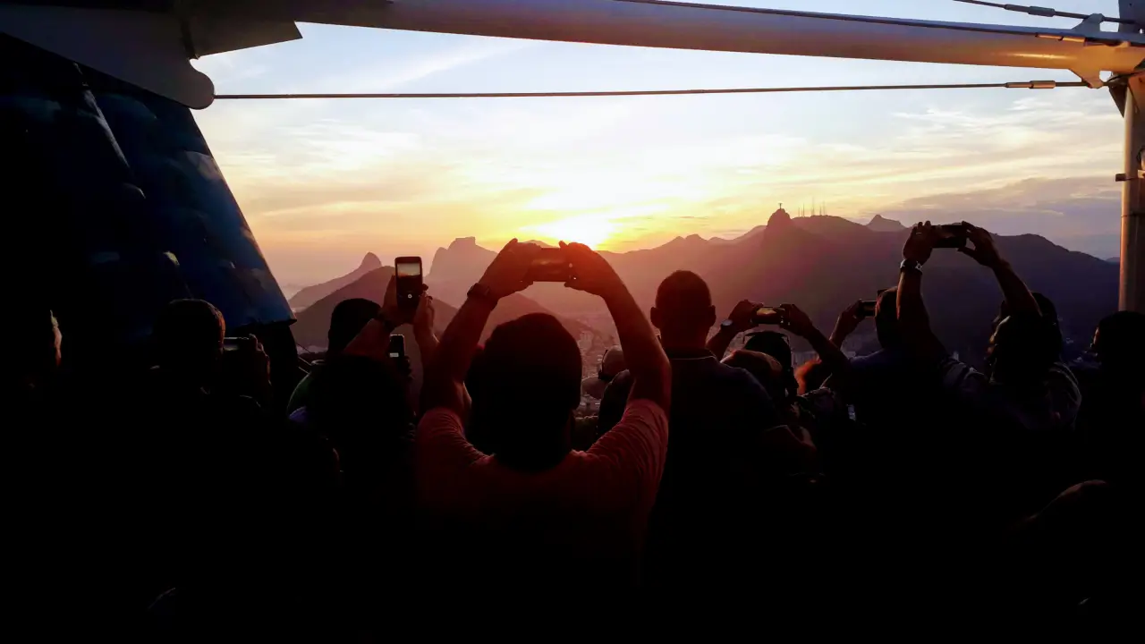 Sunset at Christ the Redeemer and Sugarloaf Mountain in Rio de Janeiro